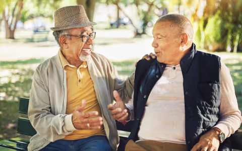 Friends talking in Park